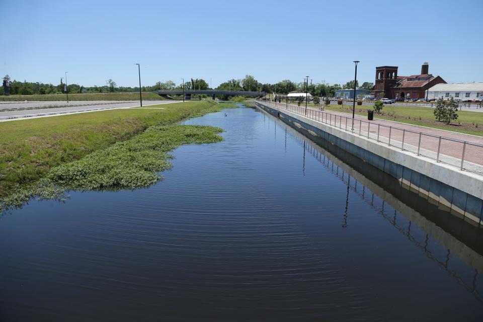 The Springfield Canal runs between the enmarket Arena and a parking lot.