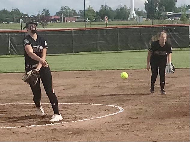 Genevieve Longsdorf of Cardington throws a pitch in the first inning against Van Buren during Friday's Division III regional championship softball game at Elida.