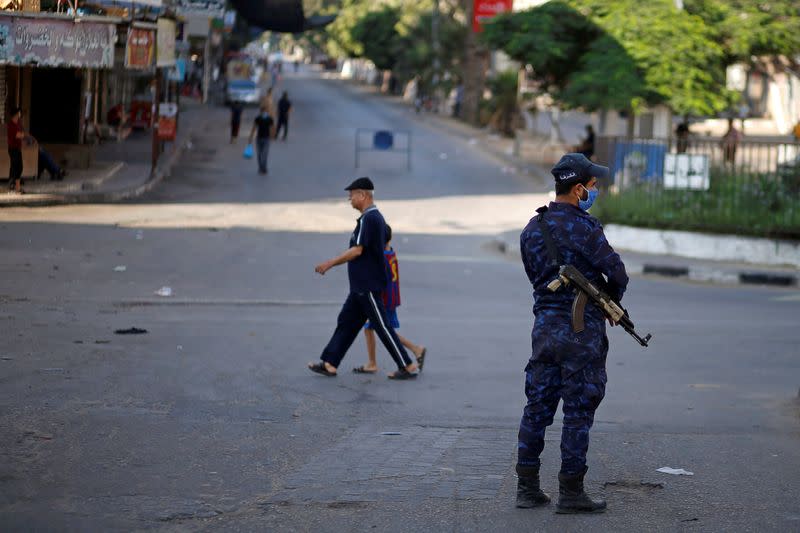 Gaza reports first COVID-19 cases outside quarantine areas, declares lockdown