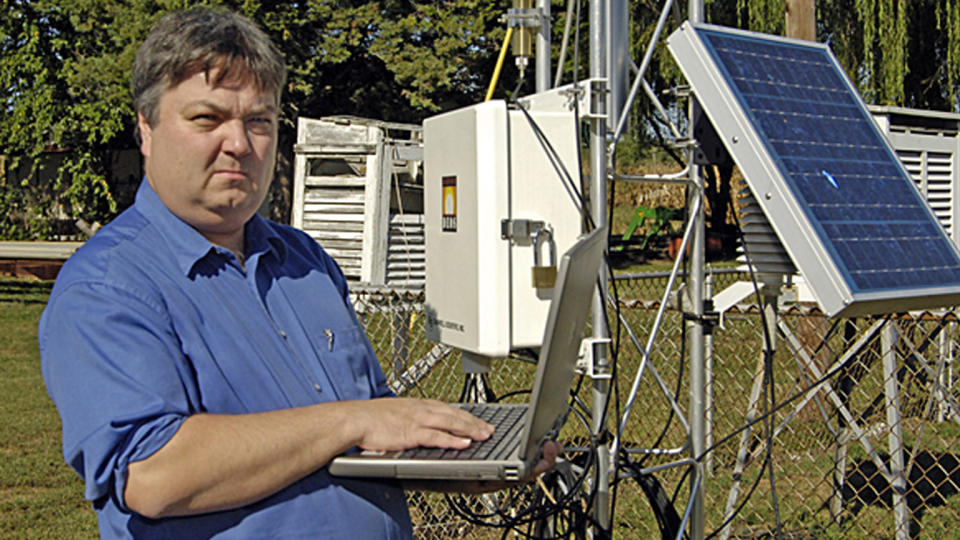 David Legates at his station on the Farm. 9/21/05 (University of Delaware)