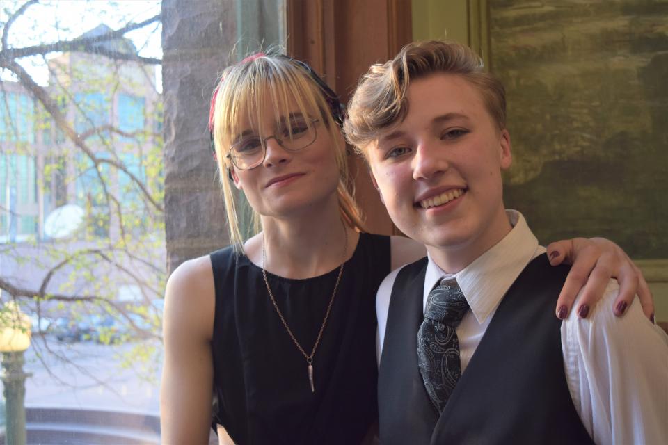 Ayden Gage (left) and Elliott Morehead (right) pose for a portrait during Pride Prom at the Old Courthouse Museum on April 28, 2023.