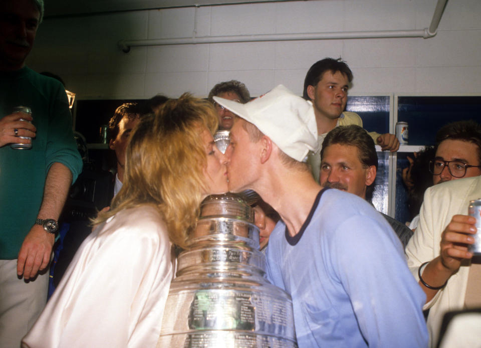 Gretzky and Jones Gretzky got married in 1988, the same year the Edmonton Oilers defeated the Boston Bruins to win the Stanley Cup. (Photo by B Bennett/Getty Images)