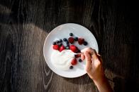 <p>Murray Grossan hasn’t had a cold in 10 years – and he attributes that long wellness run, in part, to the yogurt he eats daily. </p><p>Researchers are studying the ability of the probiotics in yogurt and other fermented foods to treat a range of conditions, from eczema to inflammatory bowel disease. “The live bacteria they contain seem to interact with the microbes in our intestines. These 100 trillion microbes produce vitamins such as B6, B12, and K2, they help fight bad bacteria such as E. coli and Salmonella, and they help keep the bowels moving (an important factor to people as they age),” says Dr. Bowers who interviewed Grossan for <em><a href="https://order.hearstproducts.com/subscribe/hstproducts/239737" rel="nofollow noopener" target="_blank" data-ylk="slk:Secrets of the World's Healthiest People.;elm:context_link;itc:0;sec:content-canvas" class="link ">Secrets of the World's Healthiest People.</a></em></p>