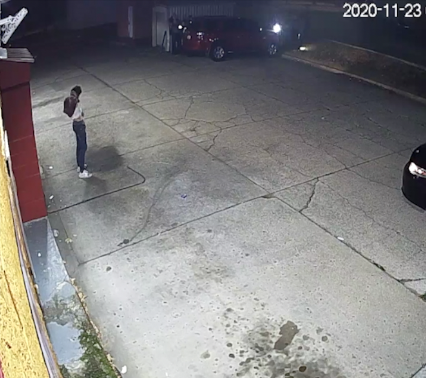 In this screen capture from a security camera, Stavian Rodriguez lifts his shirt moments before dropping a gun on the ground outside a south Oklahoma City convenience store. Police fatally shot him in 2020 after he dropped the gun.