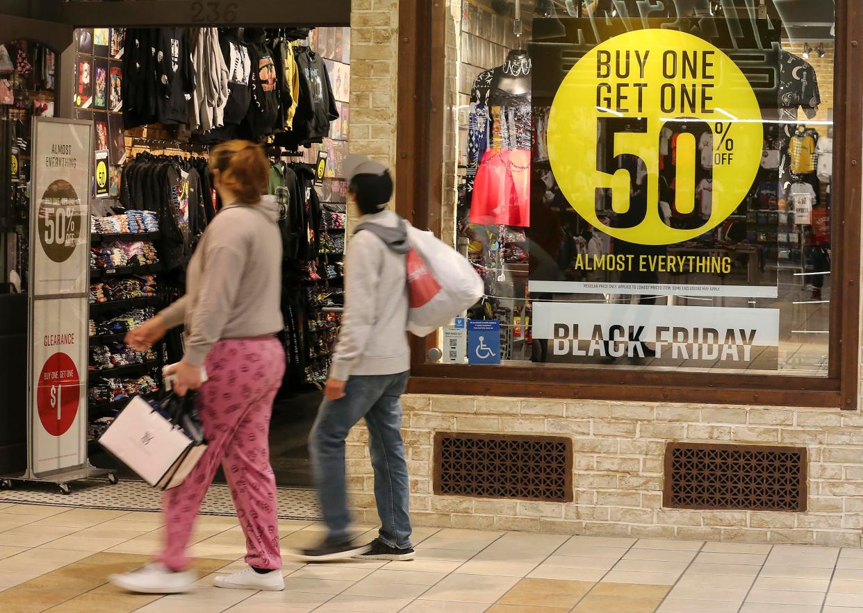 Shoppers look for bargains on Black Friday at Jefferson Mall.