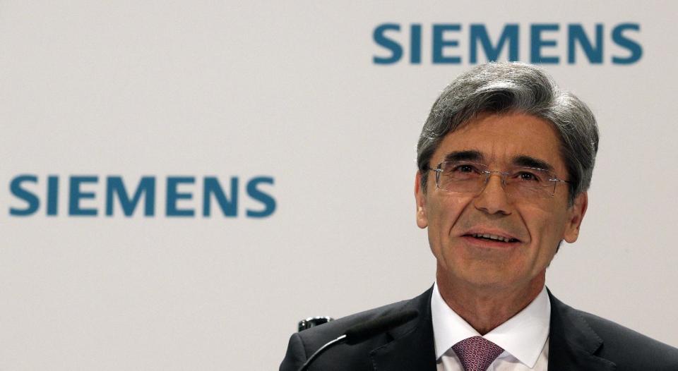 President and CEO of Siemens, Joe Kaeser speaks during the company's joint semiannual press and analyst conference in Berlin, Germany, Wednesday, May 7, 2014. Kaeser is eliminating the sprawling company's four broad sectors overseeing its businesses, and will trim those business divisions from 16 to nine. Each division will get a profit margin target as Siemens aims to focus on fields where it can grow and earn the most. (AP Photo/Michael Sohn)