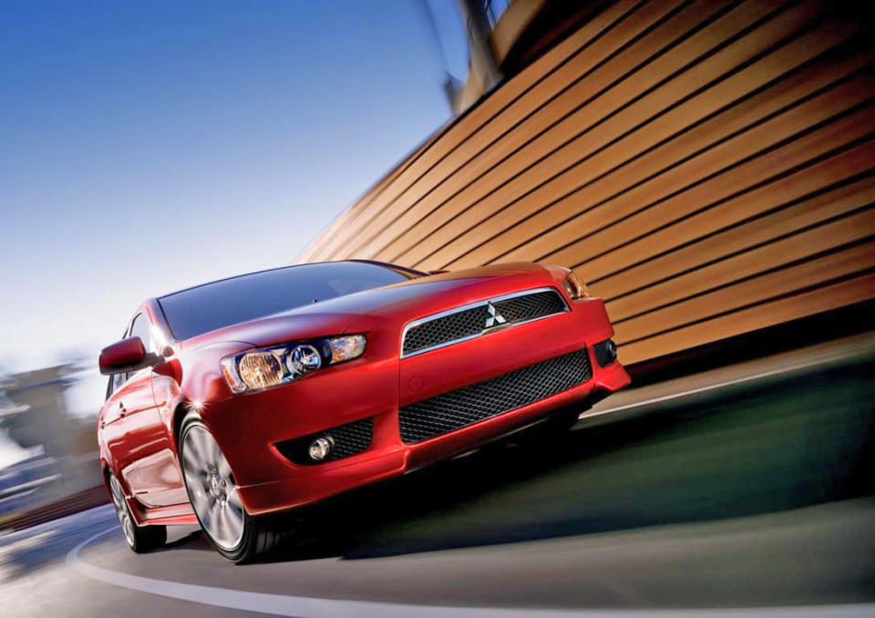 <b>Worst Compact Sedan - <a href="http://autos.yahoo.com/mitsubishi/lancer/" data-ylk="slk:2014 Mitsubishi Lancer;elm:context_link;itc:0;sec:content-canvas" class="link ">2014 Mitsubishi Lancer</a></b>: With Toyota's recent radical overhaul of its best-selling but thoroughly crummy Corolla, the Mitsubishi Lancer finds itself alone at the bottom. Though its edgy shape and shark-inspired nose look fierce when gussied up on the Evolution X, the volume-selling regular Lancer's small steel wheels, less aggressive styling and single exhaust transform this compact sedan from rally champ to rental chump.<br><br>If anything, however, styling is actually the Lancer's best attribute. The cabin is burdened with an uninspiring design, cheap hard plastic, a tilt-only steering wheel and insufficiently adjustable seats. The base engine is thrashy, gutless and less efficient than its competitors, while the optional continuously variable transmission (CVT) saps power and produces noises more typically associated with calf-bearing bovines. The optional engine is more powerful and can be equipped with all-wheel drive, but its fuel economy remains subpar.<br><br>The Lancer's biggest problem, though, is a result of its advanced age in a segment that's progressing rapidly in recent years.