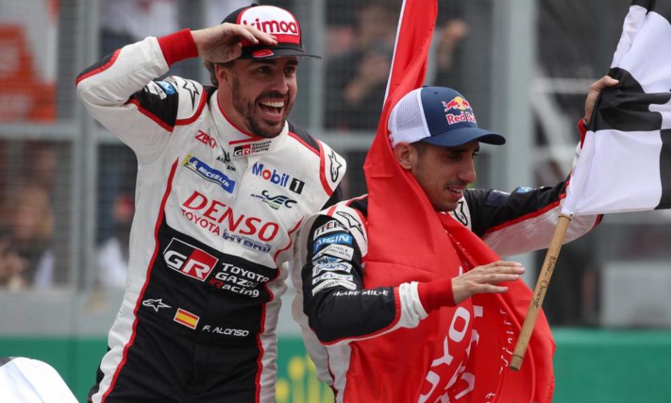 Fernando Alonso, left, and his teammate Sebastien Buemi oshow their delight after victory at Le Mans.