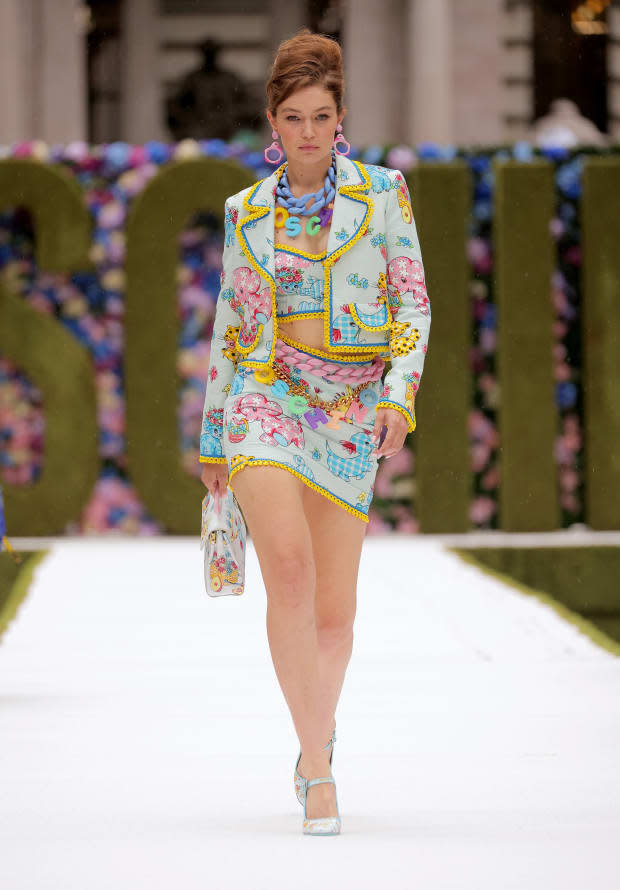 <p>A look from Moschino’s Spring 2022 collection. Photo: Randy Brooke/Getty Images</p>