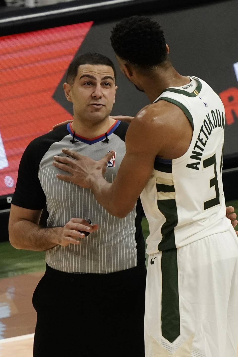 Milwaukee Bucks' Giannis Antetokounmpo argues a technical foul with referee Mousa Dagher (28) during the first half of an NBA basketball game against the Minnesota TimberwolvesTuesday, Feb. 23, 2021, in Milwaukee. (AP Photo/Morry Gash)