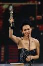 Hong Kong actress Kara Wai Ying Hung celebrates after winning Best Supporting Actress for her role in "Rigor Mortis" at the Hong Kong Film Awards April 13, 2014. REUTERS/Tyrone Siu (CHINA - Tags: ENTERTAINMENT)