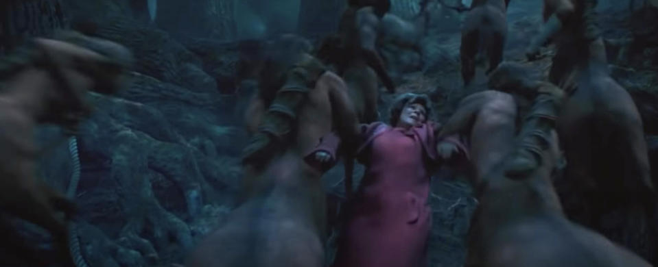 Centaurs drag Umbridge into the woods