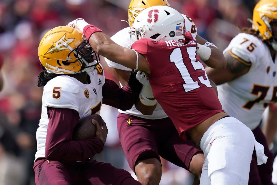 Arizona State quarterback Emory Jones (5) runs against Stanford defensive end Stephen Herron (15) during the first half of an NCAA college football game in Stanford, Calif., Saturday, Oct. 22, 2022. (AP Photo/Jeff Chiu)