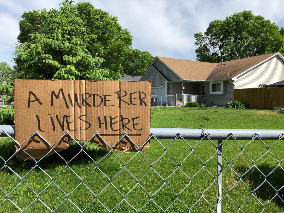 A sign outside of police officer Derek Chauvin's house in Oakdale, Minn., on May 28. | Patience Zalanga for TIME