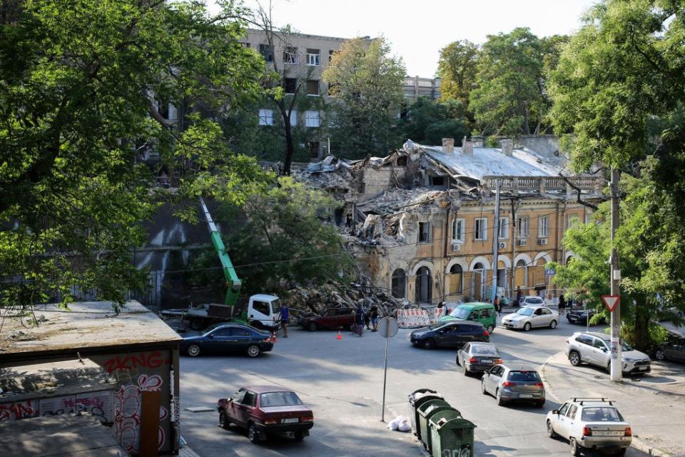 A worker cleans up the destruction caused by a rocket attack at Military Descent a day after the rocket attack in Odessa. According to the Operational Command "South", the Russian forces fired missiles in Odesa on the night of July 23, 2023, with 5 types of missiles of all types based: Caliber, Onyx, Kh-22, Iskander-M.