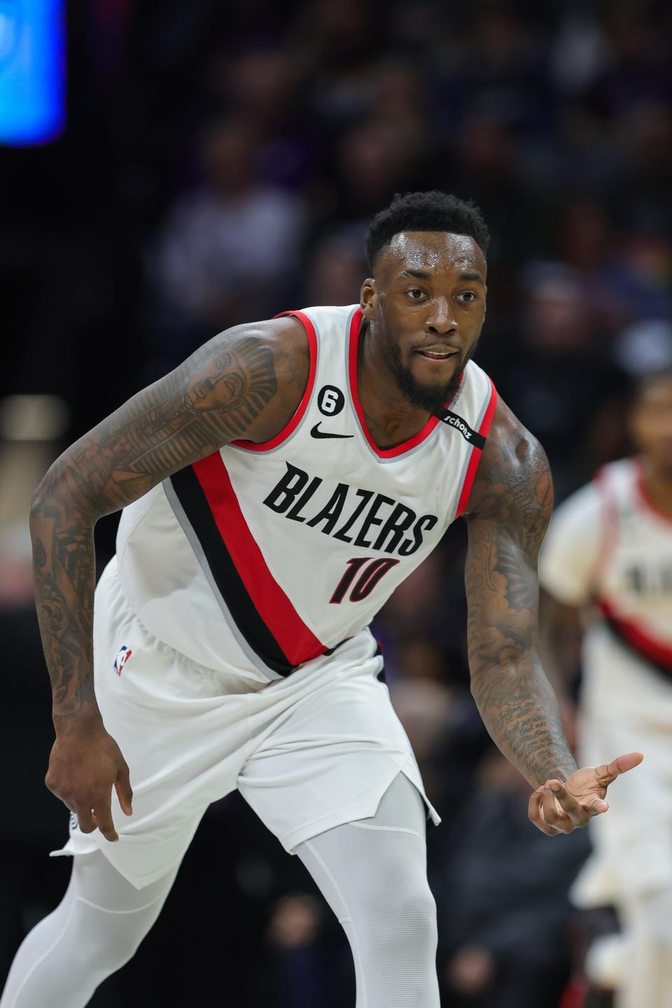 Feb 23, 2023; Sacramento, California, USA; Portland Trail Blazers forward Nassir Little (10) celebrates after a play during the third quarter against the Sacramento Kings at Golden 1 Center. Mandatory Credit: Sergio Estrada-USA TODAY Sports