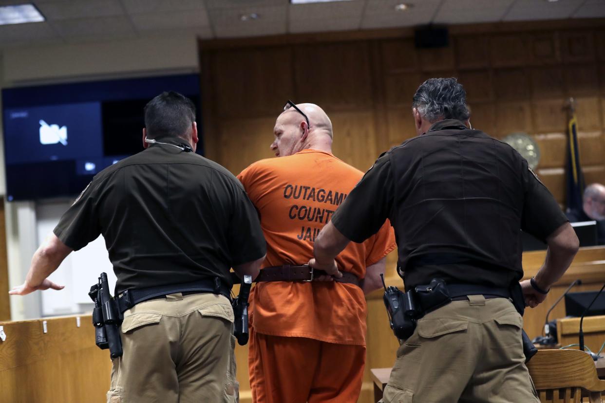 Jay Scott is escorted out of the courtroom Friday after his sentencing hearing at the Outagamie County Courthouse in Appleton.