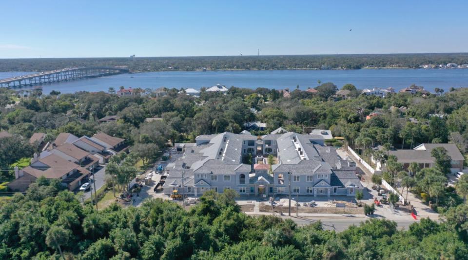 This is an aerial view of The Cupola at Oceanside luxury townhomes at 100 N. Halifax Drive in Ormond Beach as the gated 12-unit two-story development nears completion. A "topping off" ceremony is set for Thursday, Nov. 30, 2023, from 4 to 6 p.m. The first residents are expected to move in the week after Thanksgiving.