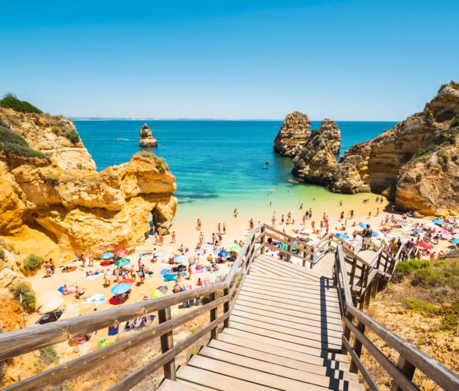 The Algarve's famed sandy coves are home to Praia do Marinha, a Michelin Guide top-10er.<p>Getty Images</p>