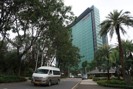 FILE PHOTO: A Huawei sign is seen at its headquarters in Shenzhen, Guangdong province, China, December 6, 2018. To match Special Report HUAWEI-USA/CAMPAIGN REUTERS/Thomas Suen/File Photo