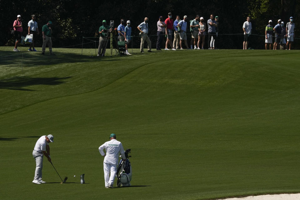 Bryson DeChambeau hits from the fairway on the second19 hole during a practice round for the Masters golf tournament on Monday, April 5, 2021, in Augusta, Ga. (AP Photo/Charlie Riedel)