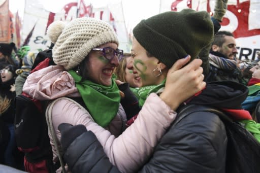 Abortion rights activists celebrated wildly outside of Congress when news came that the measure was approved