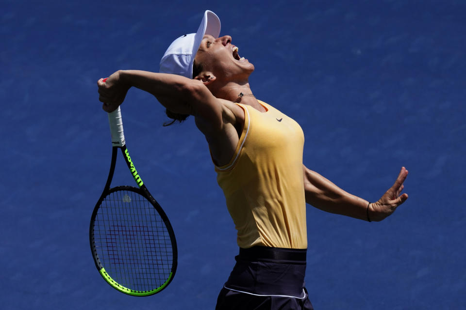 Simona Halep, of Romania, serves to Jennifer Brady during a second round match at the Rogers Cup tennis tournament in Toronto, Wednesday, Aug. 7, 2019. (Mark Blinch/The Canadian Press via AP)