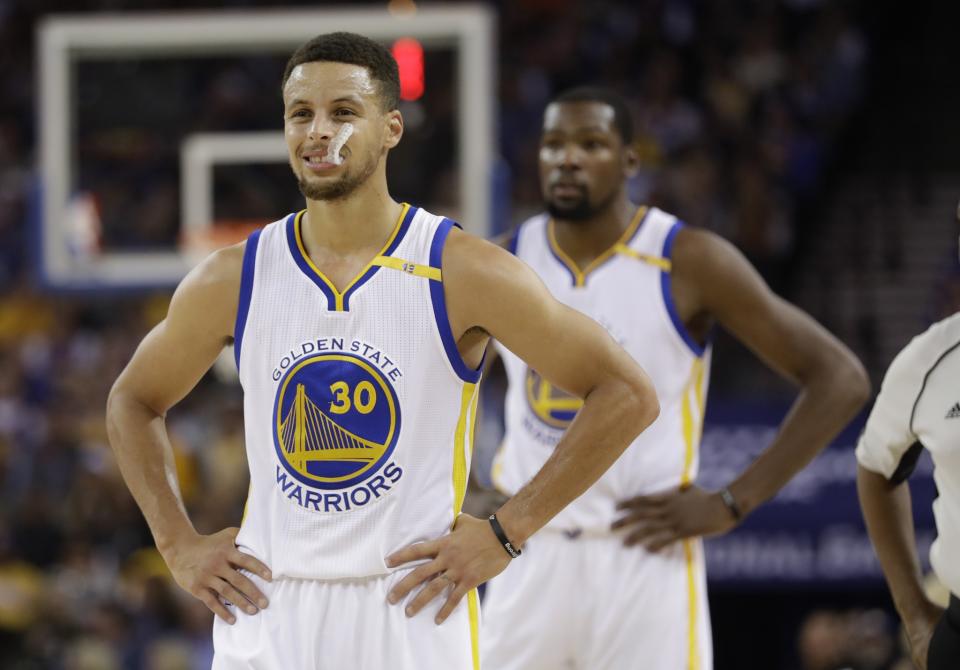 The Warriors have max contracts looming over their shoulder for both Stephen Curry and Kevin Durant. (AP)