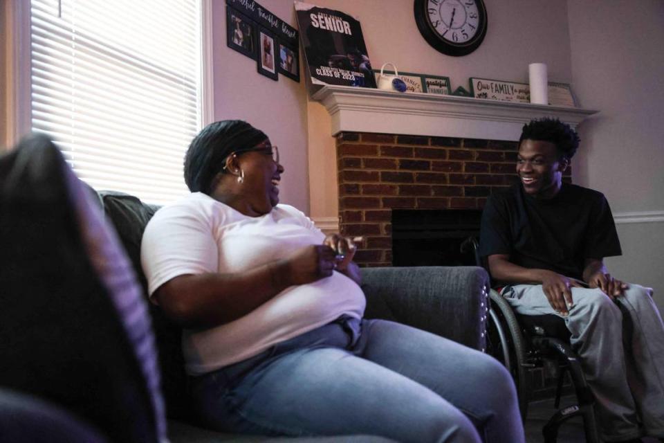 Loretta Gaddy, left, with her son Chrishaun Hough at home in Indian Trail.