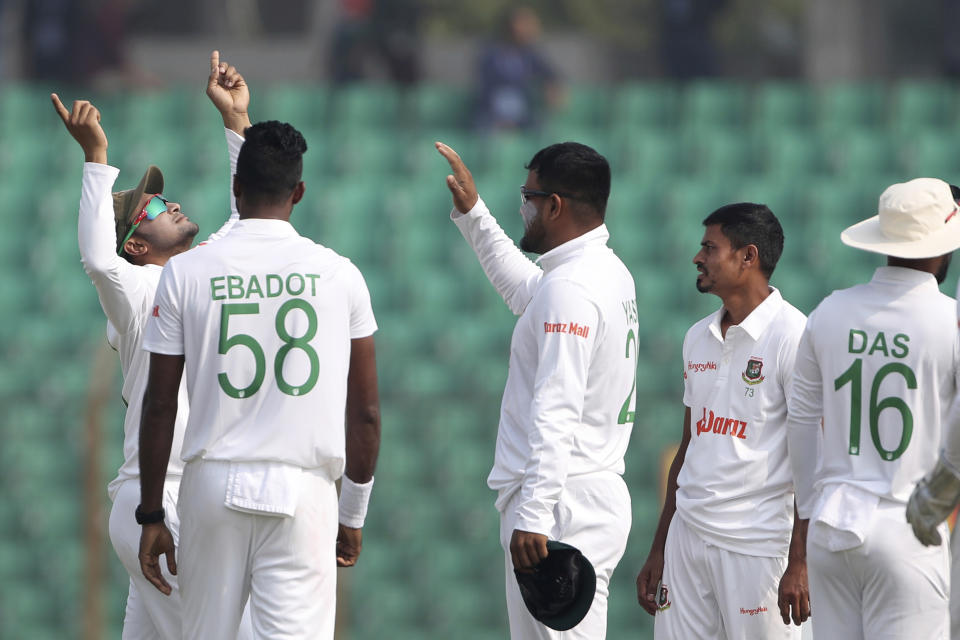 Bangladesh's Taijul Islam center and Shakib Al Hasan left celebrates wicket of India's Shubman Gill during the first Test cricket match day one between Bangladesh and India in Chattogram Bangladesh, Wednesday, Dec. 14, 2022. (AP Photo/Surjeet Yadav)