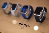 An Apple Watch logo is seen inside an Apple Store in Berlin April 10, 2015. REUTERS/Stefanie Loos