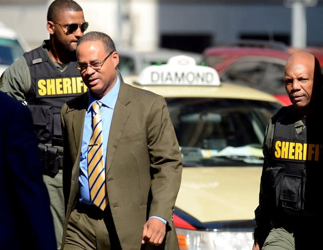 Officer Caesar Goodson (L) arrives at the courthouse in Baltimore, Maryland, U.S., June 20, 2016.  REUTERS/Bryan Woolston