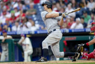 New York Yankees' DJ LeMahieu (26) hits a three-run home run in the ninth inning of a baseball game against the Philadelphia Phillies, Saturday, June 12, 2021, in Philadelphia. (AP Photo/Laurence Kesterson)