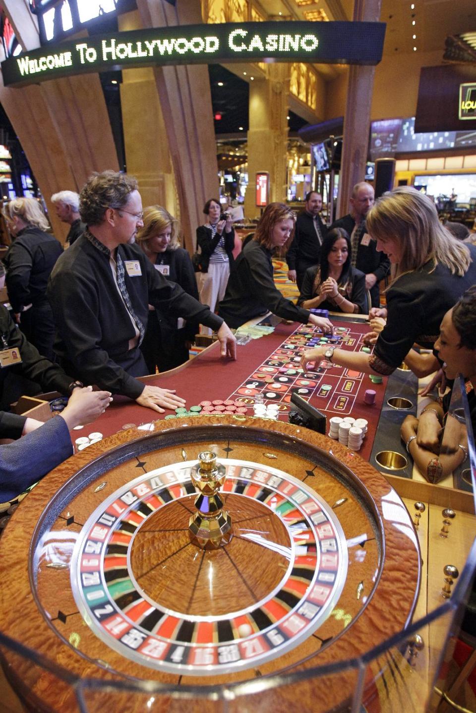 This Monday, May 21, 2012 photo shows the roulette table at the Hollywood Casino in Toledo, Ohio. Ohio's entry into casino gambling this spring isn't good news for its neighboring states. States including Indiana, Michigan and Pennsylvania are likely to lose millions in tax revenues as more Ohioans stay home to gamble. That could mean less money for new schools, college scholarships, roads and bridges.The new casino, the second in Ohio, is scheduled to open May 29. (AP Photo/Mark Duncan)