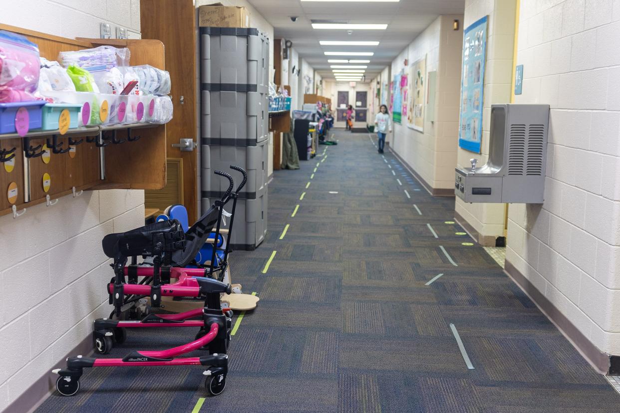 Due to limited space, teachers use the school hallways for storage outside their classrooms in Aurora’s Miller Elementary School.