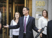 In this Monday July 8, 2019 photo, lawyer Brad Edwards, center, leaves federal court with his clients Michelle Licata, left, and Courtney Wild, right, after wealthy financier Jeffrey Epstein appeared for his arraignment in New York. Licata and Wild, two of Epstein's accusers, say they feel empowered after he was charged with sex trafficking and conspiracy charges. Epstein pleaded not guilty to the charges and will remain jailed until at least July 15 when a bail hearing is set on the case. (AP Photo/Bebeto Matthews)