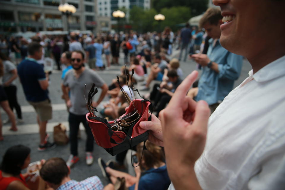 <p>A man shows off his specially made goggles to watch the total solar eclipse in Union Square, New York City, on Aug. 21, 2017. (Gordon Donovan/Yahoo News) </p>