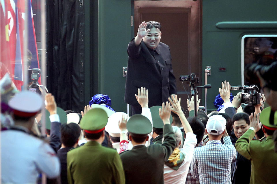 FILE- North Korean leader Kim Jong Un waves at the Dong Dang railway station in Dong Dang, Vietnam, on March 2, 2019. North Korean leader Kim Jong Un’s possible trip to Russia might be like his first one in 2019, a rattling, 20-hour ride aboard a green-and-yellow armored train that is a quirky symbol of his family’s dynastic leadership. (AP Photo/Minh Hoang, File)