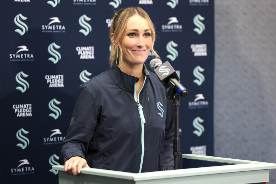 Seattle Kraken new assistant coach Jessica Campbell takes questions during an NHL hockey press conference, Wednesday, July 3, 2024, in Seattle. Campbell will become the first woman to work on the bench of an NHL franchise after the team hired her as an assistant coach Wednesday .(AP Photo/Jason Redmond)