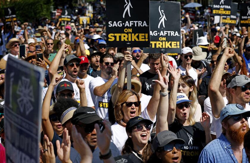 BURBANK-CA-AUGUST 22, 2023: SAG-AFTRA and WGA join forces with the AFL-CIO and its affiliates from across the nation and across industries for a national day of solidarity rally outside of Disney Studios in Burbank on August 22, 2023, fighting for fair contracts, better compensation, safe working conditions and protections from encroaching technology. (Christina House / Los Angeles Times)