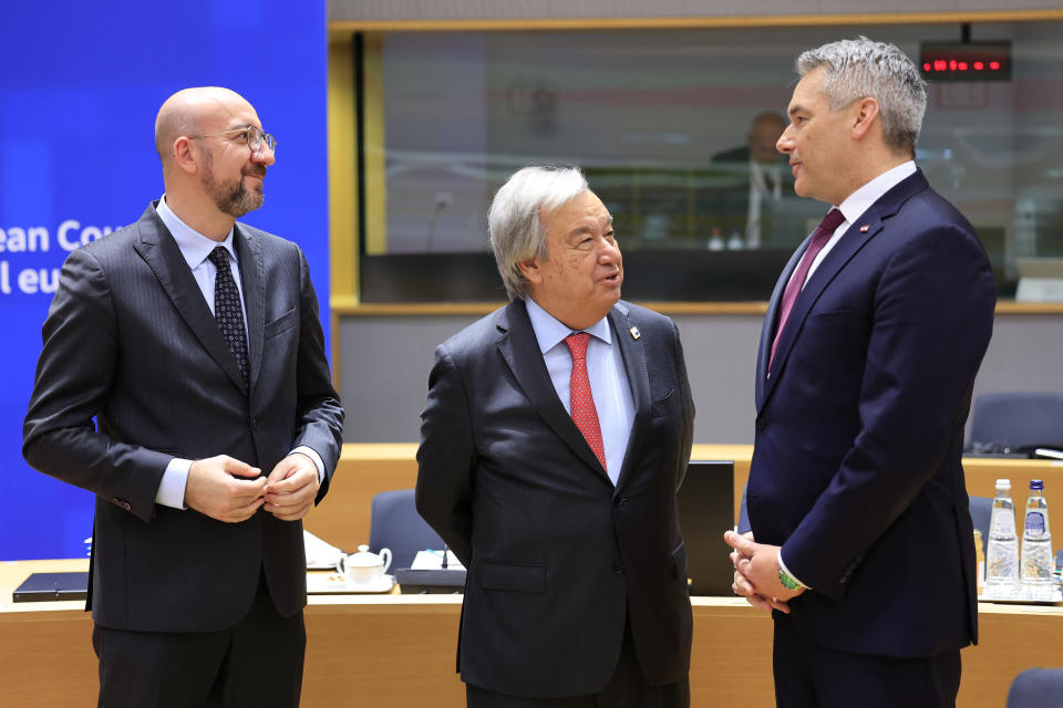 United Nations Secretary General Antonio Guterres, center, speaks with European Council President Charles Michel, left, and Austria's Chancellor Karl Nehammer during a round table meeting at an EU Summit in Brussels, Thursday, March 21, 2024. European Union leaders are gathering to consider new ways to help boost arms and ammunition production for Ukraine. Leaders will also discuss in Thursday's summit the war in Gaza amid deep concern about Israeli plans to launch a ground offensive in the city of Rafah. (AP Photo/Geert Vanden Wijngaert)