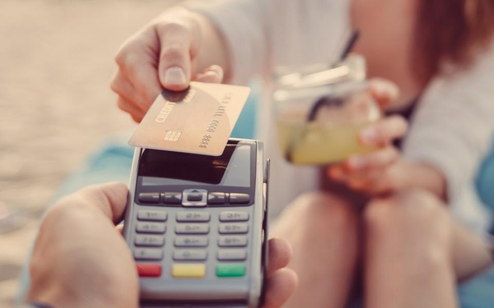 contactless payment on beach