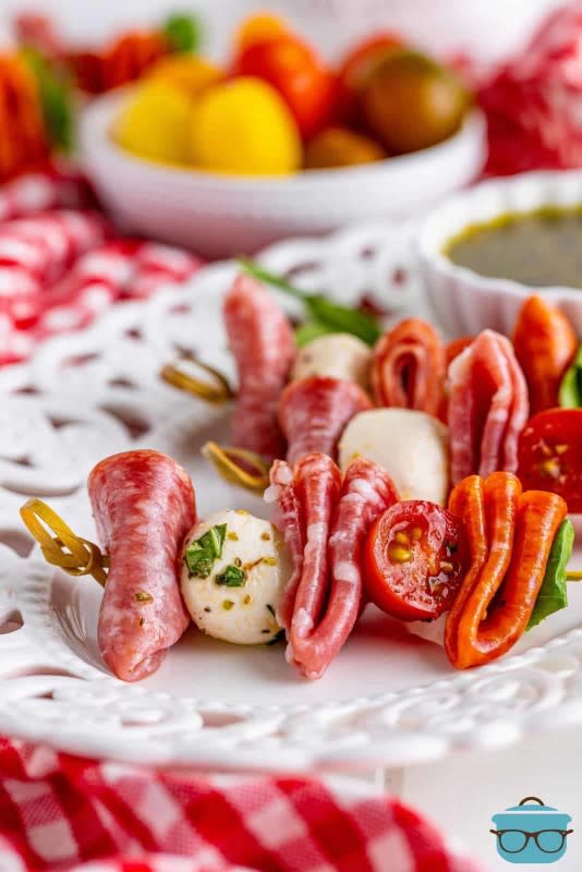 <p>The Country Cook</p><p>All the meat, cheese, veggies and dressing from a big Italian sub, but on a stick so it's easier to party with.</p><p><strong>Get the recipe: <a href="https://www.thecountrycook.net/italian-sub-skewers" rel="nofollow noopener" target="_blank" data-ylk="slk:Italian Sub Skewers;elm:context_link;itc:0;sec:content-canvas" class="link rapid-noclick-resp">Italian Sub Skewers</a></strong></p>