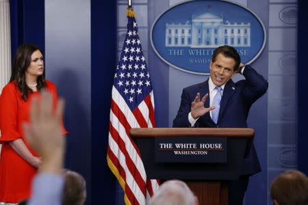New White House Communications Director Anthony Scaramucci, flanked by White House Press Secretary Sarah Sanders, speaks at the daily briefing at the White House in Washington, U.S. July 21, 2017. REUTERS/Jonathan Ernst