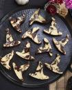 <p>A hint of espresso and a cream cheese swirl make these witchy brownies a dessert to remember. </p><p>Get the <strong><a href="https://www.countryliving.com/food-drinks/a23317932/black-bottom-brownies-recipe/" rel="nofollow noopener" target="_blank" data-ylk="slk:Black-Bottom Brownies recipe;elm:context_link;itc:0;sec:content-canvas" class="link ">Black-Bottom Brownies recipe</a> </strong>from Country Living. </p>