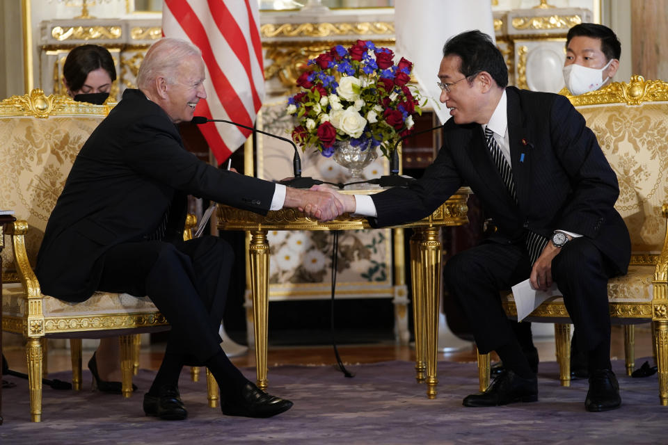 President Joe Biden shakes hands with Japanese Prime Minister Fumio Kishida during a bilateral meeting at Akasaka Palace, Monday, May 23, 2022, in Tokyo. (AP Photo/Evan Vucci)