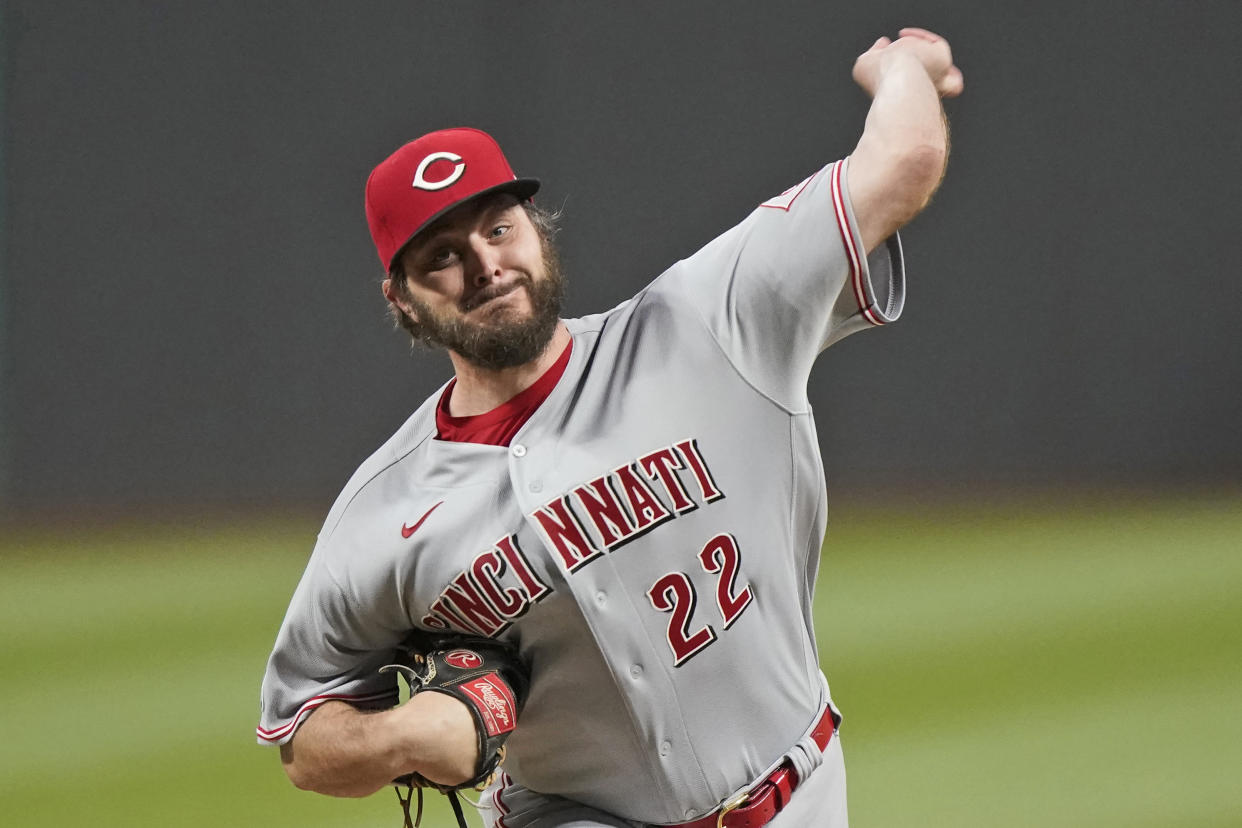 Cincinnati Reds starting pitcher Wade Miley delivers in the first inning of a baseball game against the Cleveland Indians Friday, May 7, 2021, in Cleveland. (AP Photo/Tony Dejak)