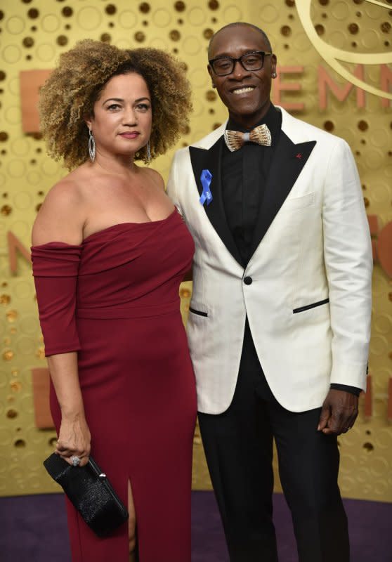 Bridgid Coulter (L) and Don Cheadle arrive for the 71st annual Primetime Emmy Awards held at the Microsoft Theater in downtown Los Angeles on September 22, 2019. Cheadle turns 59 on November 29. File Photo by Christine Chew/UPI