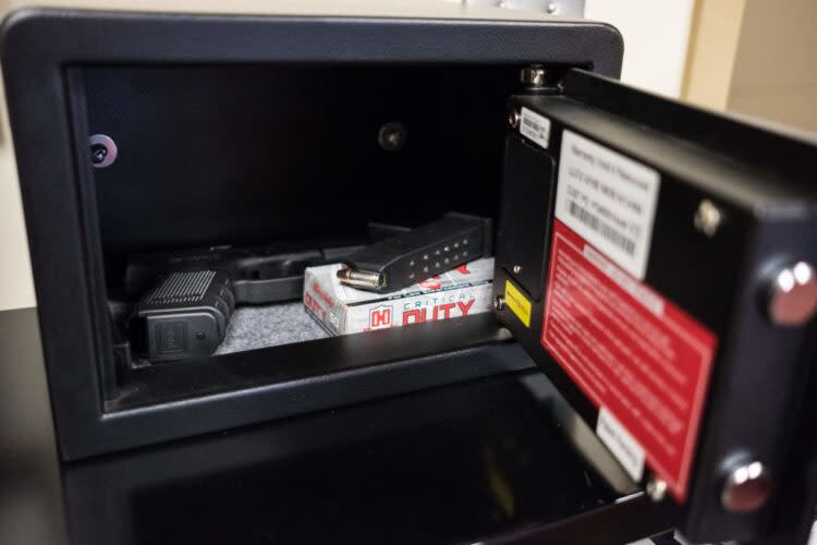 Guns in a fingerprint-activated safe are placed in designated classrooms around a high school in Sidney, Ohio, in case of an active shooter. (Megan Jelinger/Getty Images)