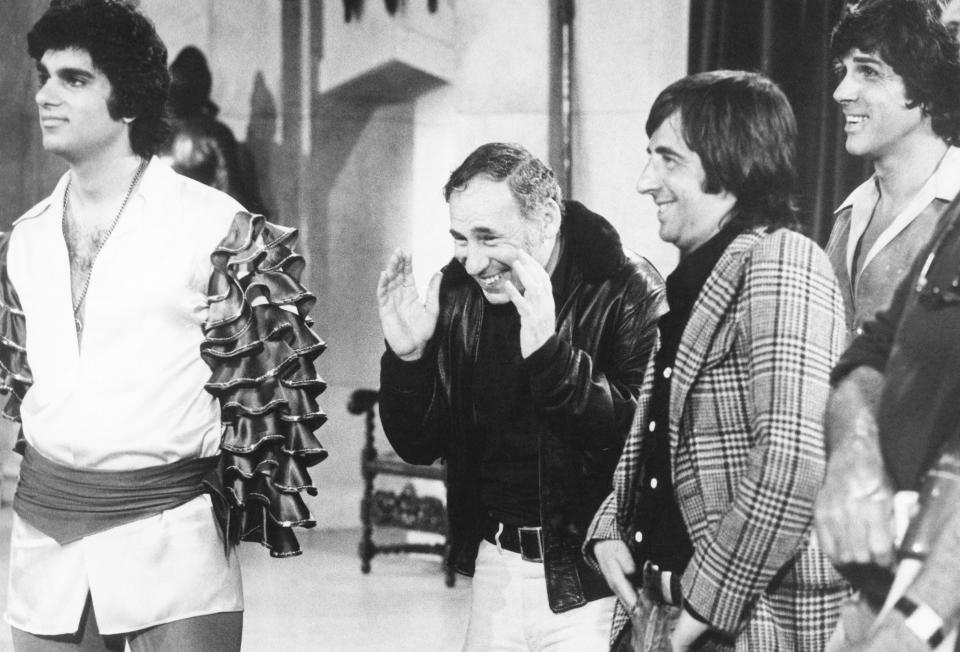 From left: Richard Dimitri, Mel Brooks, Norman Steinberg and Dick Gautier, on the set of ‘When Things Were Rotten,’ 1975.
